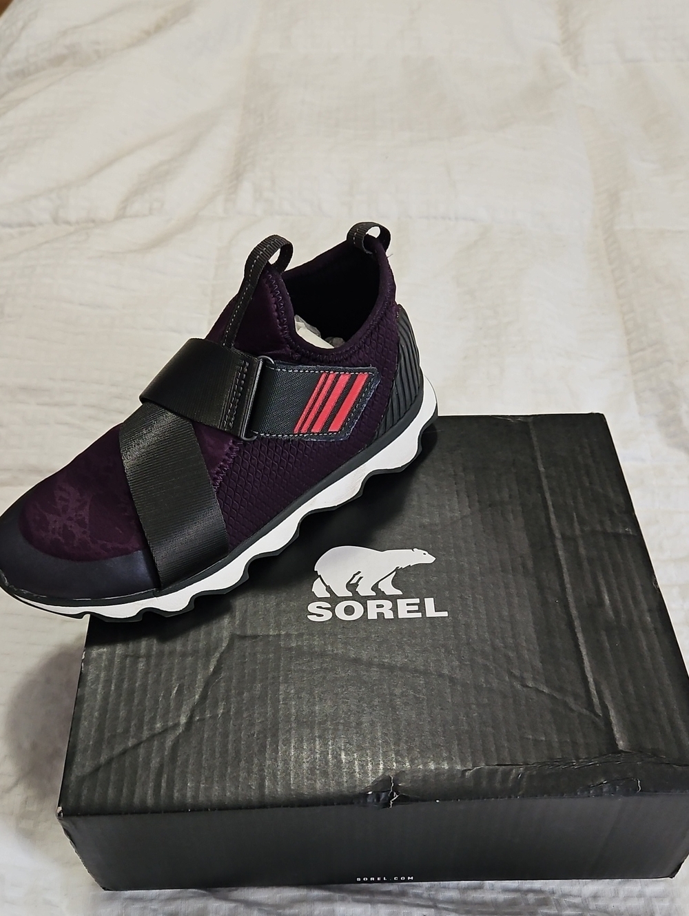 Sorel Women Slip-On Sneaker in Plum with Red Accent